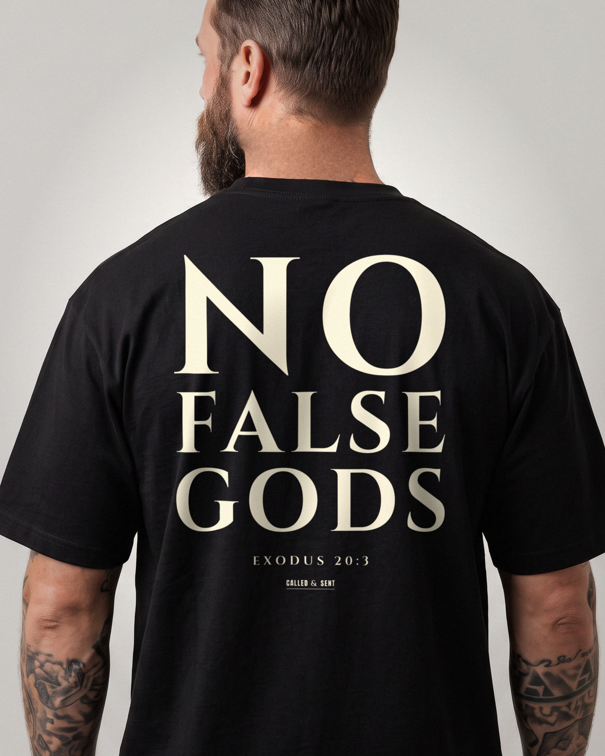 No False Gods heavyweight tee, Black, 6 oz Ultra Cotton boxy classic cut, plain front and bone ink NO FALSE GODS back print, Exodus 20:3