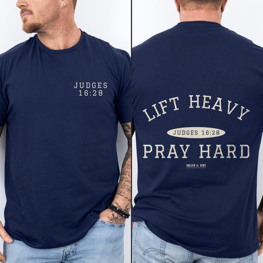 Lift Heavy Pray Hard Christian gym shirt, Navy, worn by a man, front chest verse badge with collegiate varsity back lockup and verse plate, Judges 16:28