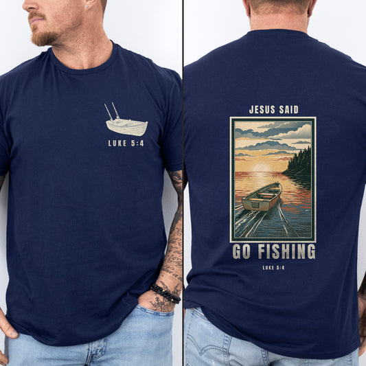 Jesus Said Go Fishing Christian fishing shirt, navy, worn by a man, sunrise boat back print, Luke 5:4