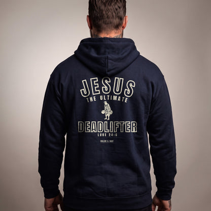 Jesus the Ultimate Deadlifter Christian hoodie, Navy, worn by a man, back view, Luke 24:6 back print