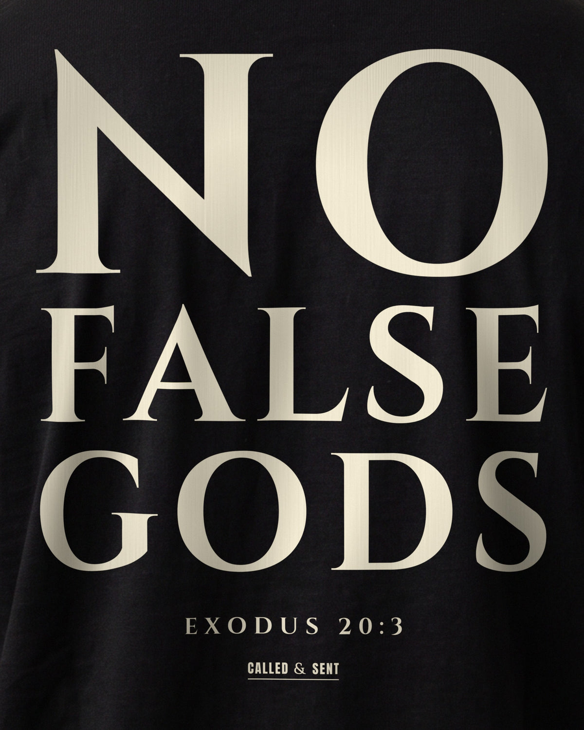 No False Gods heavyweight tee close-up of the NO FALSE GODS print on the garment, Exodus 20:3, Black