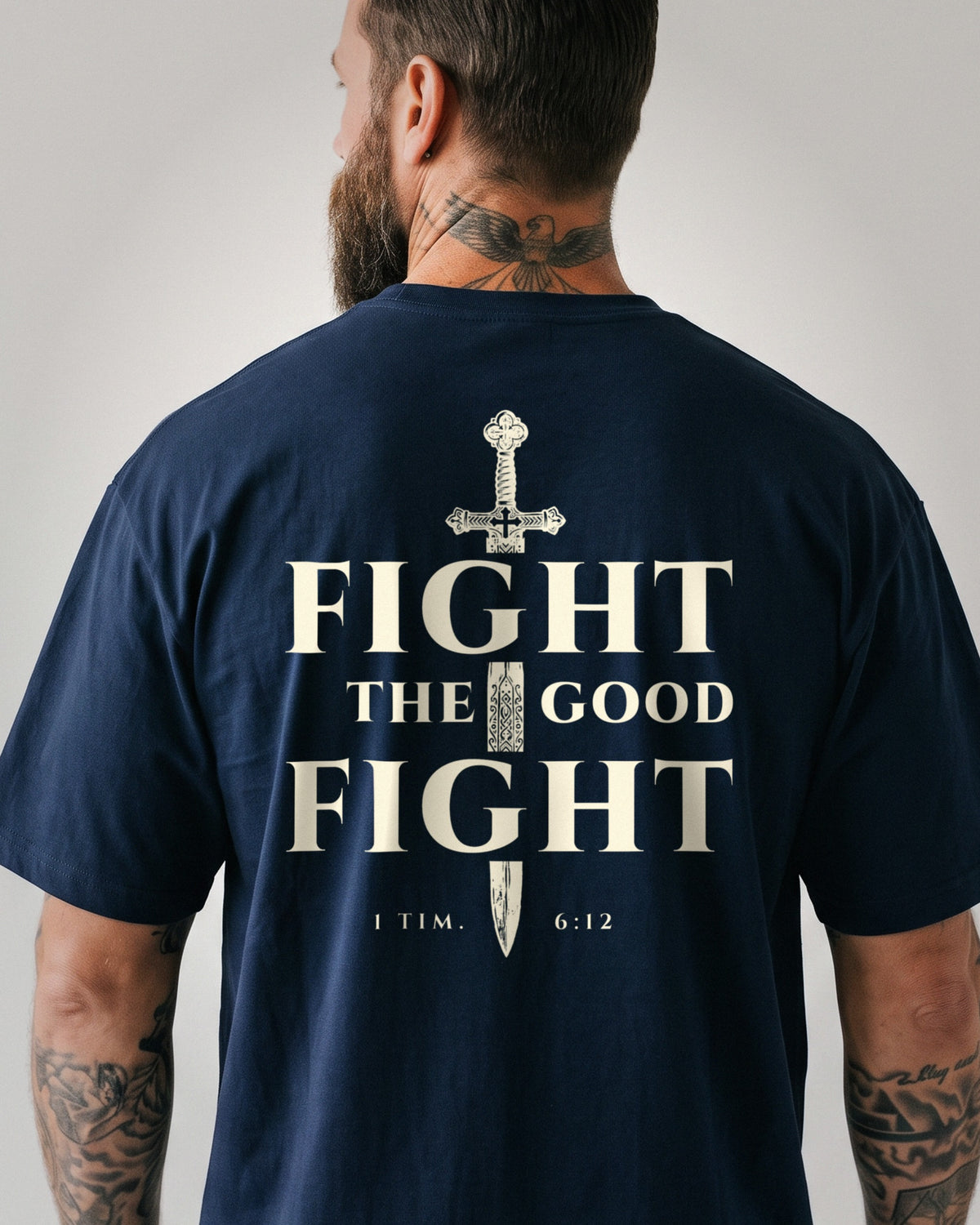 Fight The Good Fight heavyweight tee, Navy, 6 oz Ultra Cotton boxy classic cut, plain front and bone ink FIGHT THE GOOD FIGHT sword cross back print, 1 Timothy 6:12