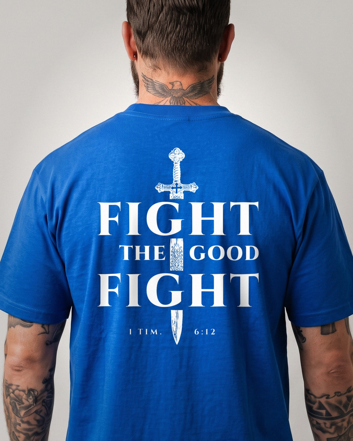 Fight The Good Fight heavyweight tee, Royal Blue, 6 oz Ultra Cotton boxy classic cut, plain front and white ink FIGHT THE GOOD FIGHT sword cross back print, 1 Timothy 6:12