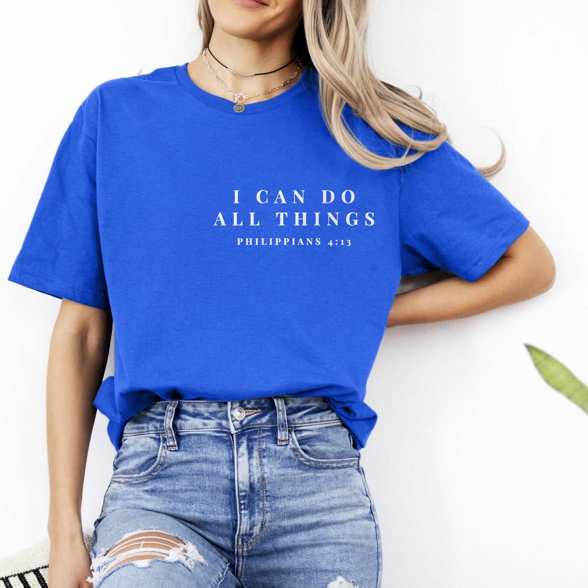 I Can Do All Things Christian gym shirt, Royal Blue, worn by a woman, small quiet chest print, Philippians 4:13