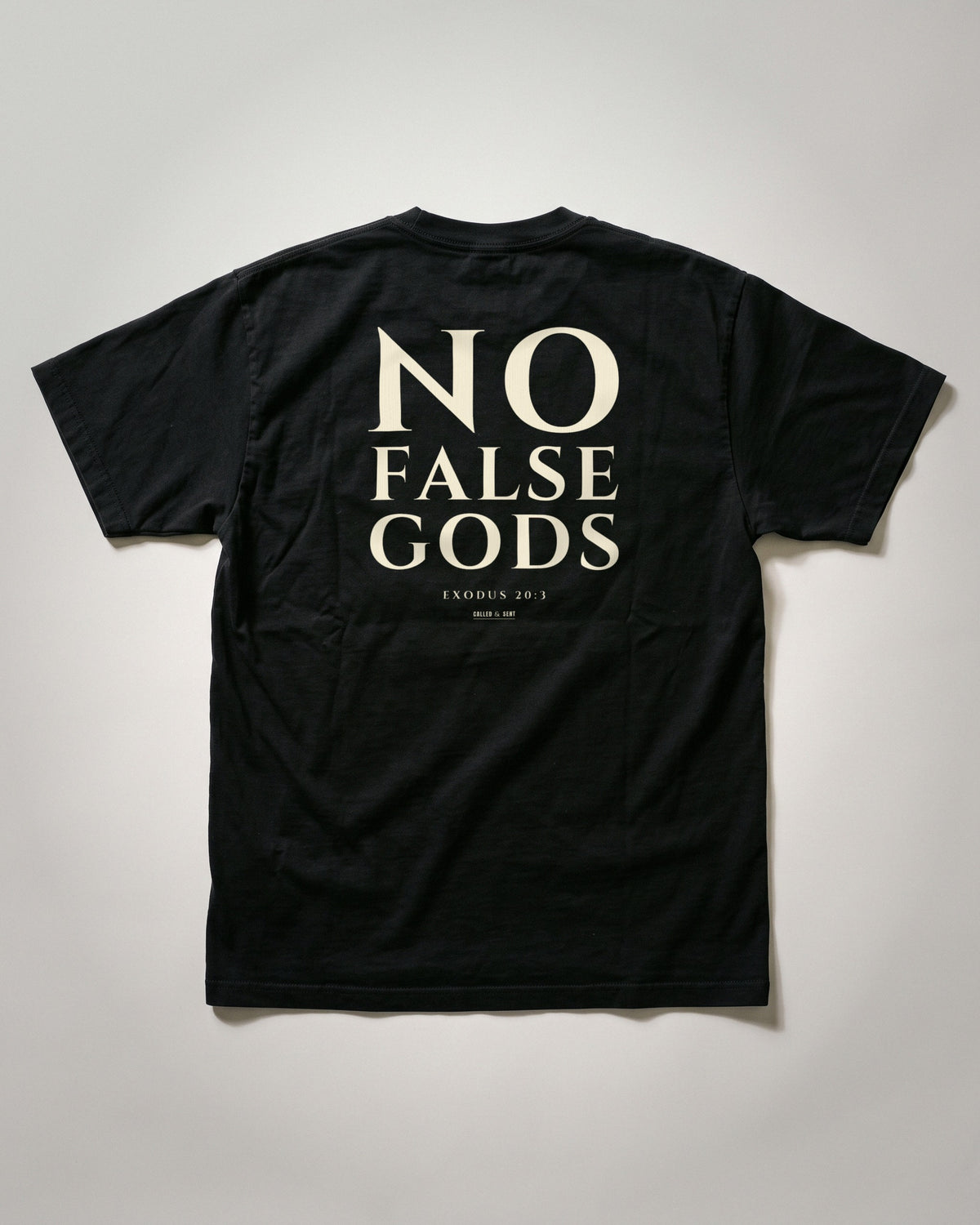 No False Gods heavyweight tee flat lay of the back print shown on an XL, Exodus 20:3, Black