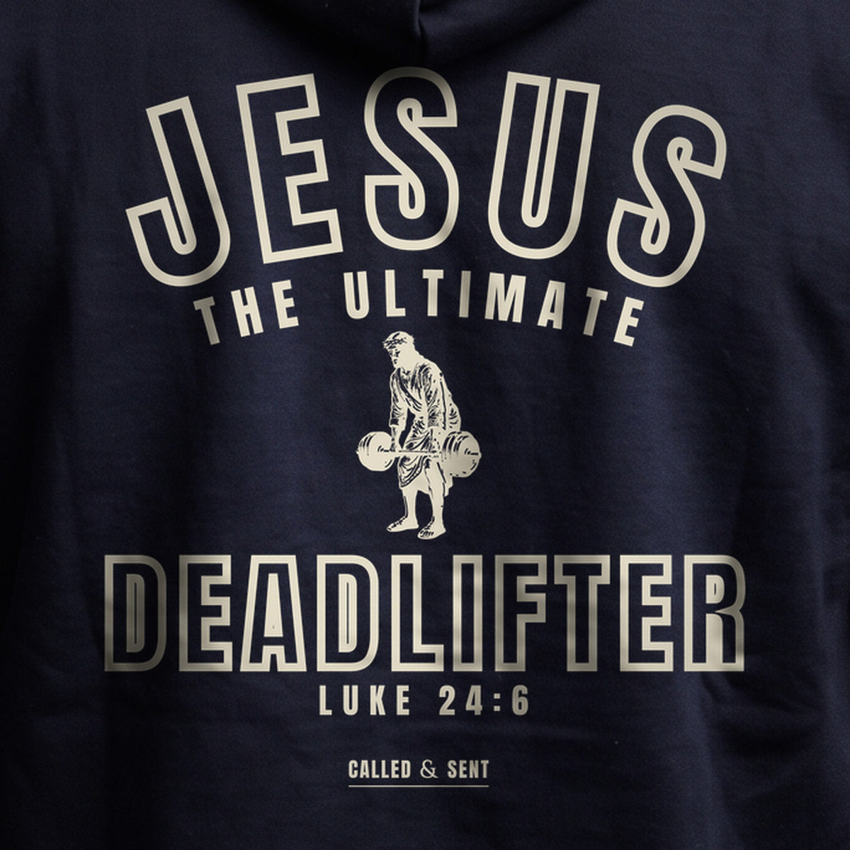 Closeup of the Jesus the Ultimate Deadlifter back print on the Navy hoodie