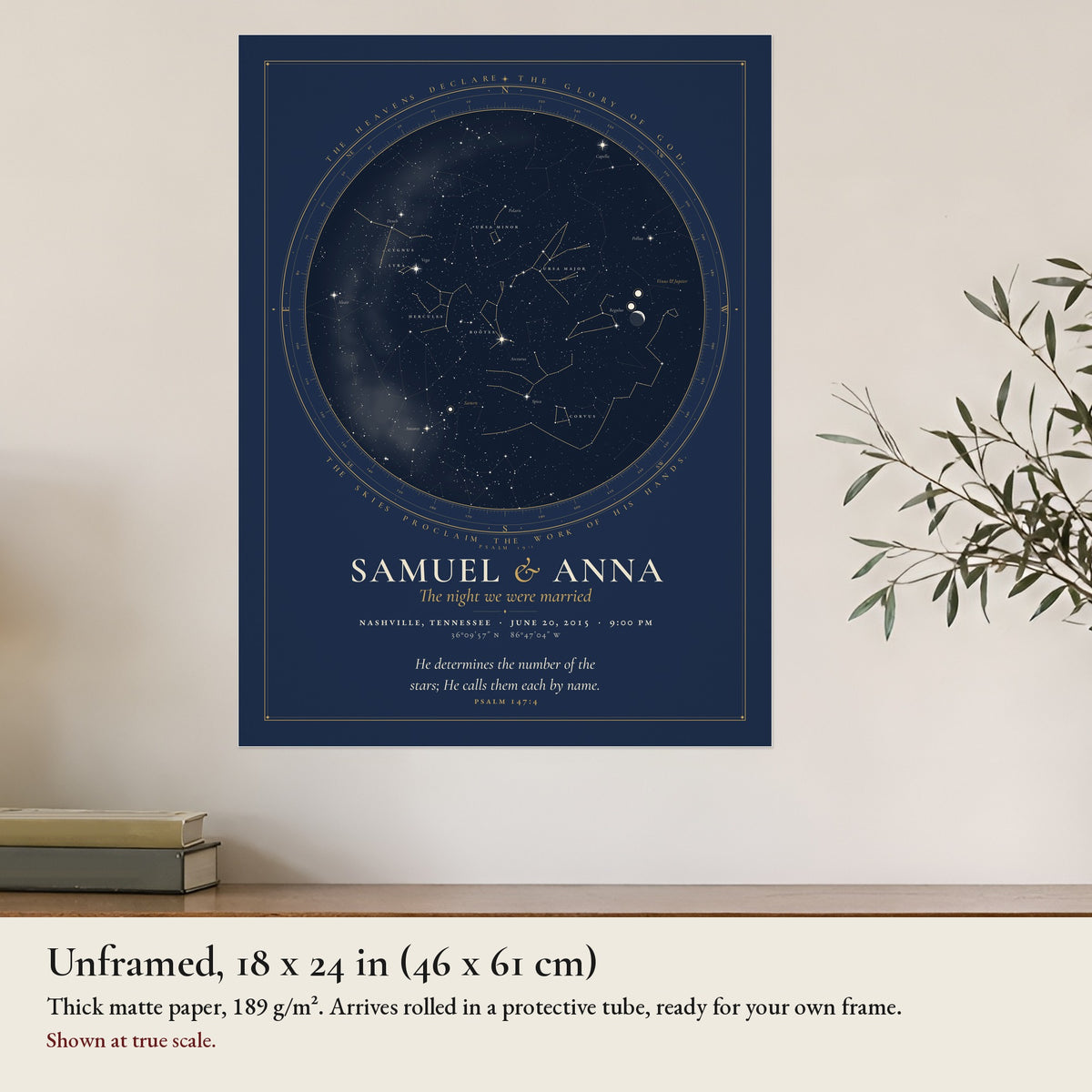 The unframed 18 x 24 in Covenant print at true scale on a wall above a wooden sideboard, thick matte paper, rolled in a protective tube