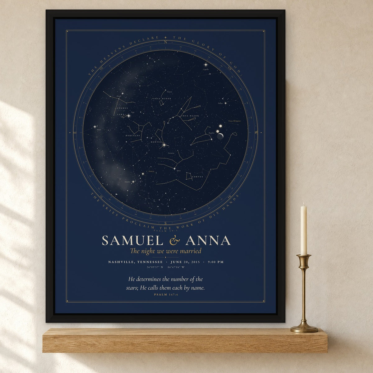 Framed canvas print of a night sky chart in a black floating frame, names Samuel and Anna, The night we were married, Nashville, Tennessee, hung on a cream wall above an oak shelf with a brass candlestick